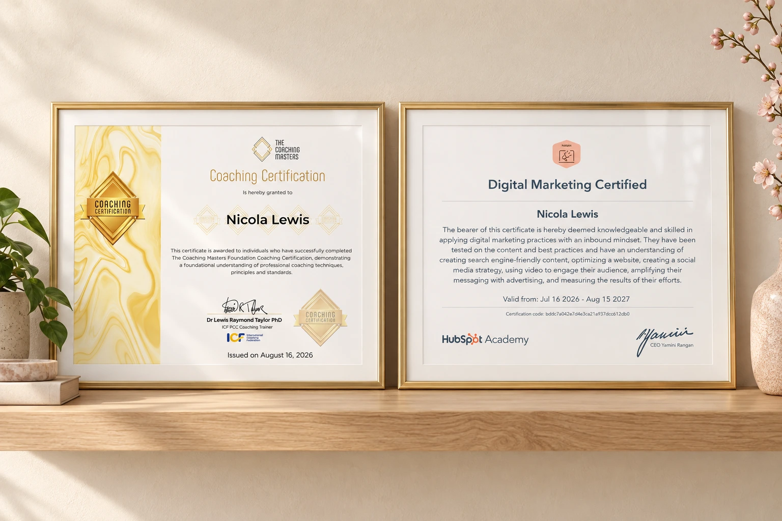 Nic’s coaching and digital marketing certificates displayed in champagne-gold frames on a wooden shelf